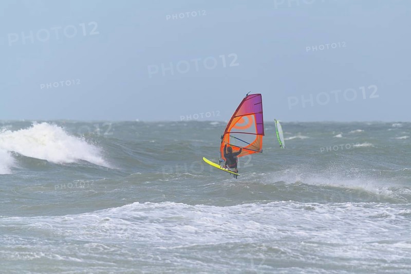 Breaking Wave with surfer