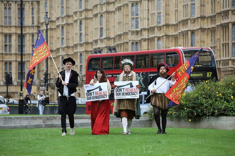 Henry VIII at Westminster as anti-Brexit protestors dressed in Tudor costumes demand protection for democracy. London