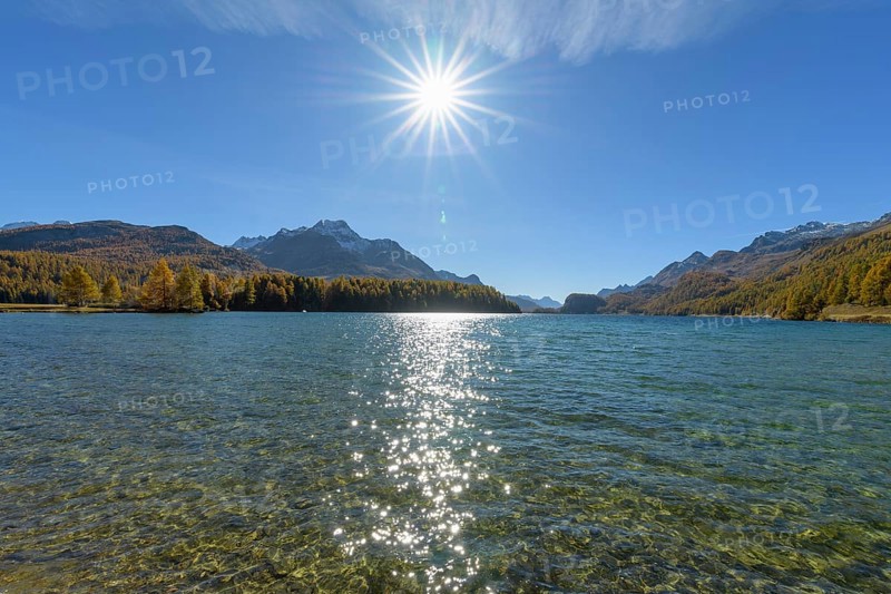 Lake Silsersee with sun in autumn