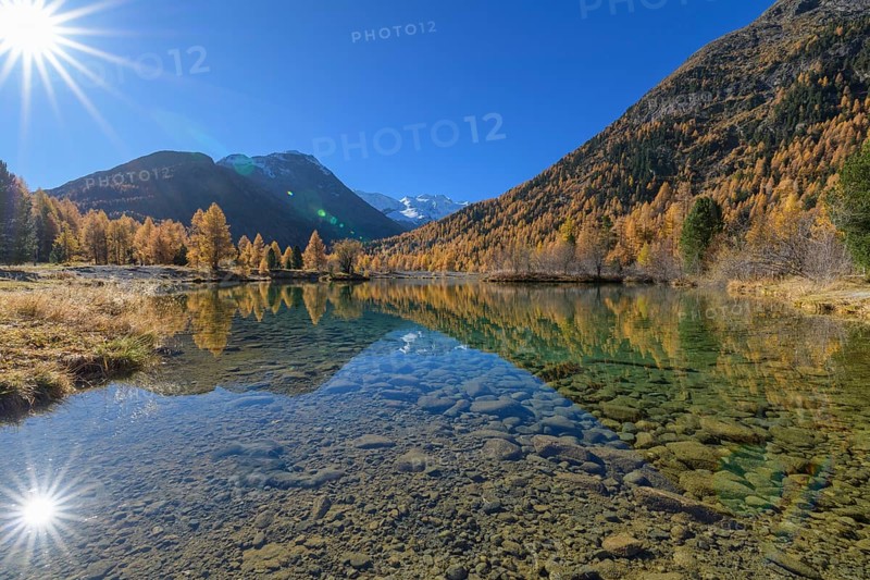 Lake with sun in autumn