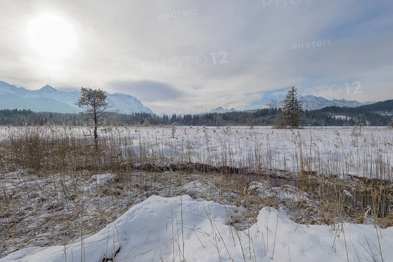 Lake Barmsee with Karwendel mountainrange on morning in winter