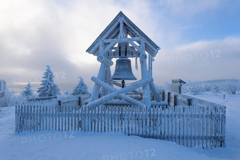 Peace bell on the summit of Fichtelberg with snow in winter
