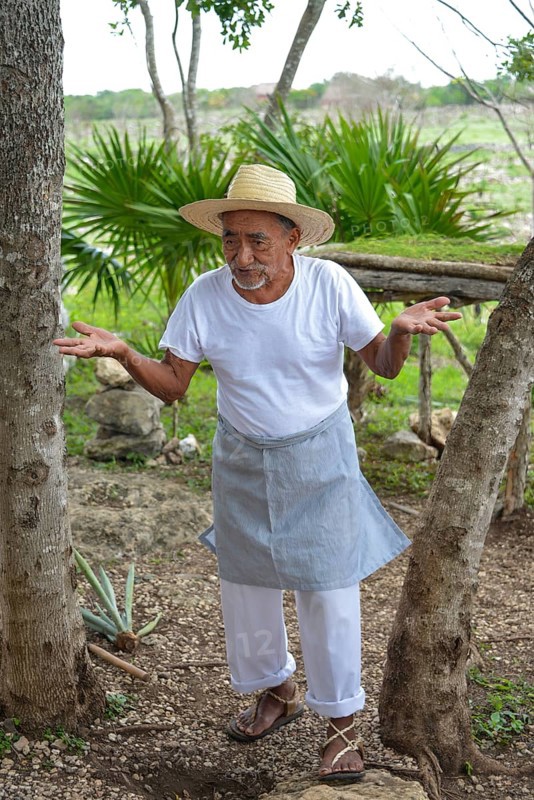 Old farmer explaining the production of sisal