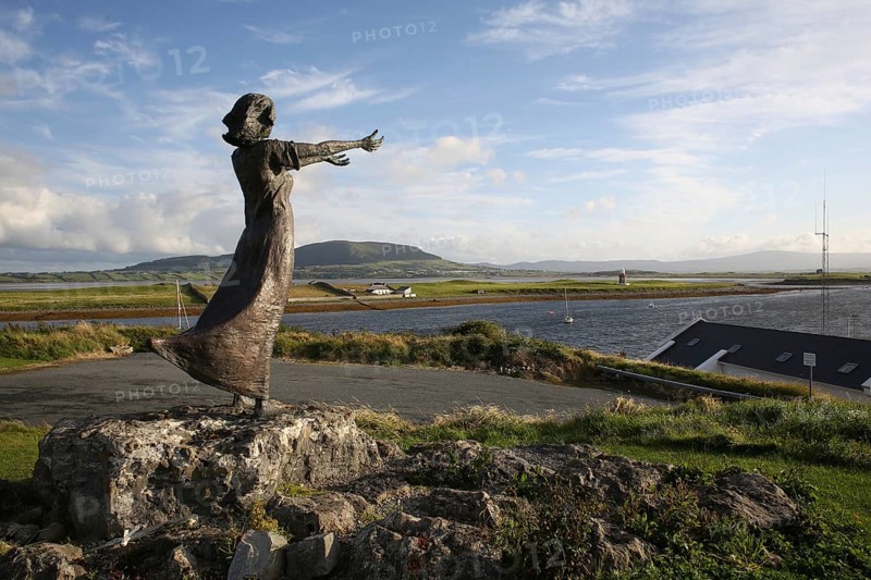 Niall Bruton emigration statue and landscape scene at Rosses Point. Sligo