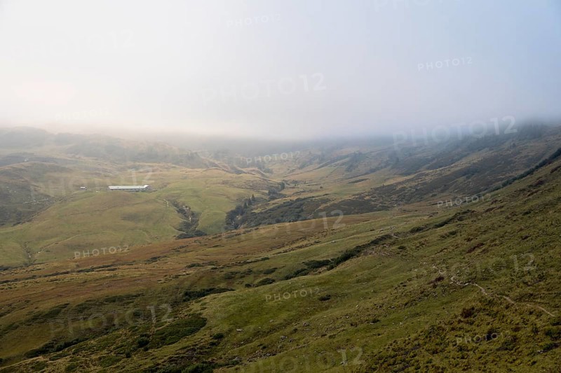 Fog in the high valley on an autumn evening at Potlakopf
