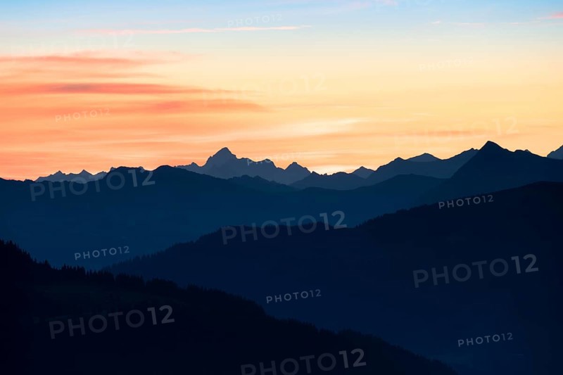 Mountain panorama in front of sunrise from Portlakopf