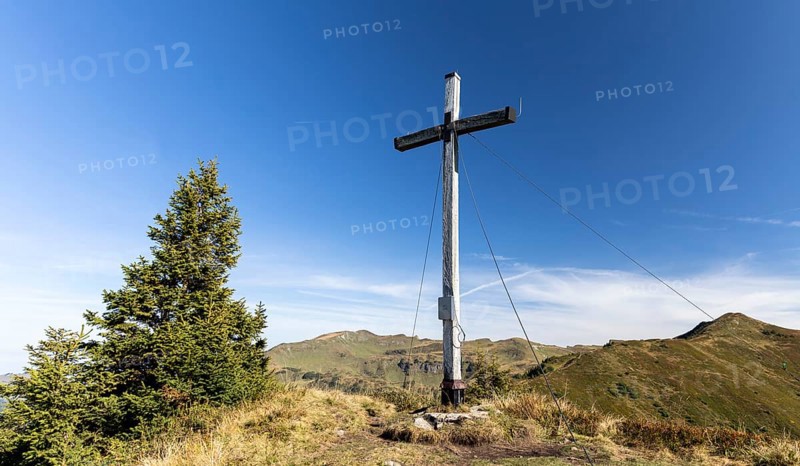 Summit cross in the morning light on Portlakopf