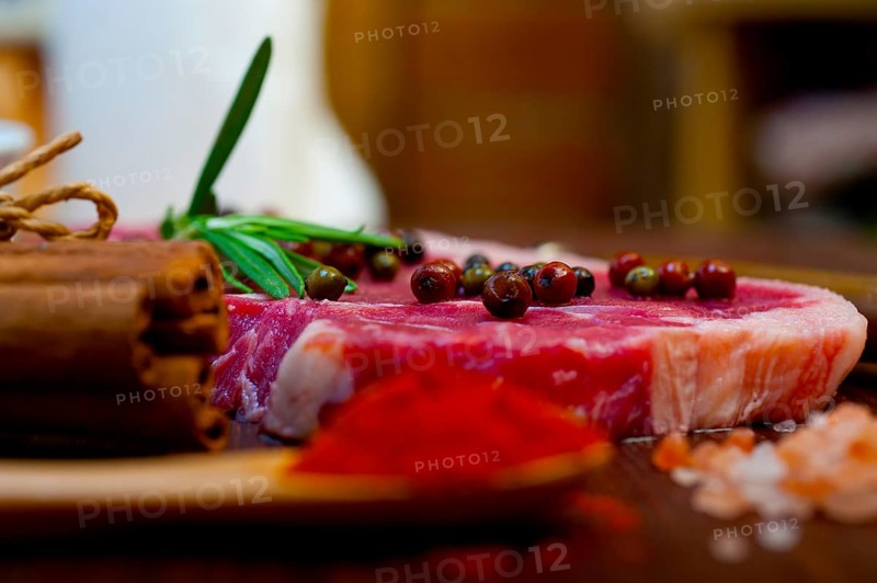 Raw uncooked ribeye beef steak butcher selection