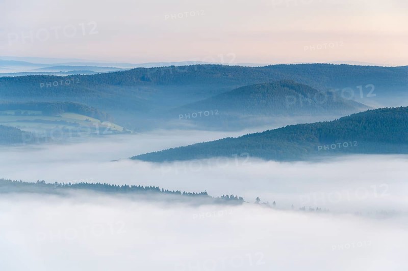 View from Katzenbuckel mountain with morning mist