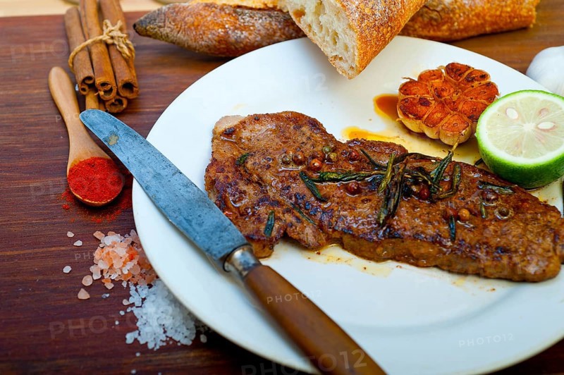 Roasted grilled ribeye beef steak butcher selection