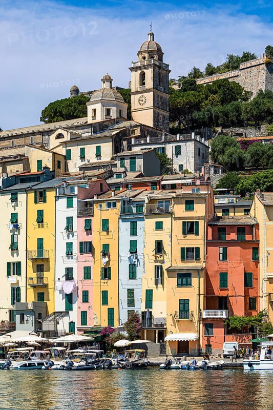 Pastel-coloured house facades in the harbour of Portovenere