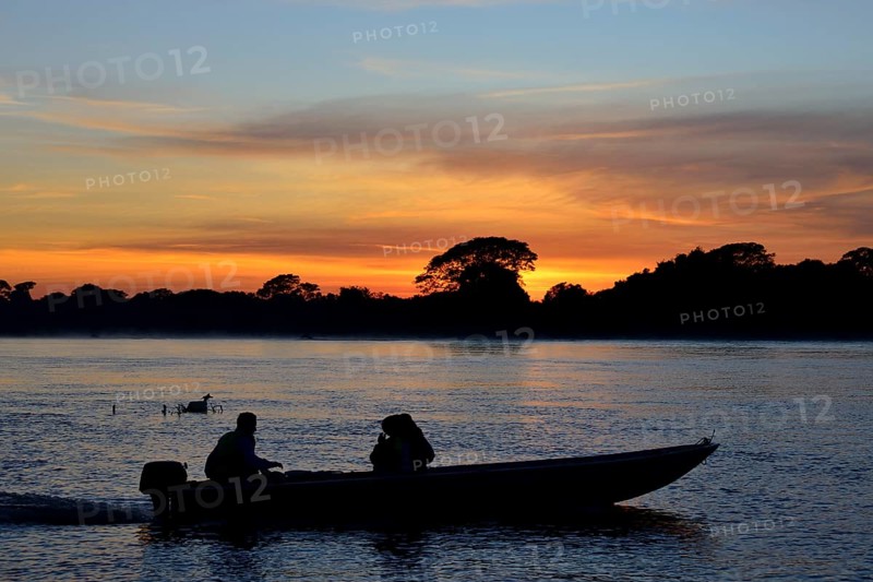 Tourist boat on the Rio Sao Lourenco at sunrise