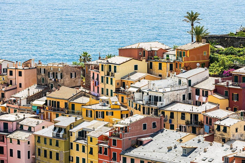 The village of Vernazza with its nested pastel-coloured houses built into the hillside