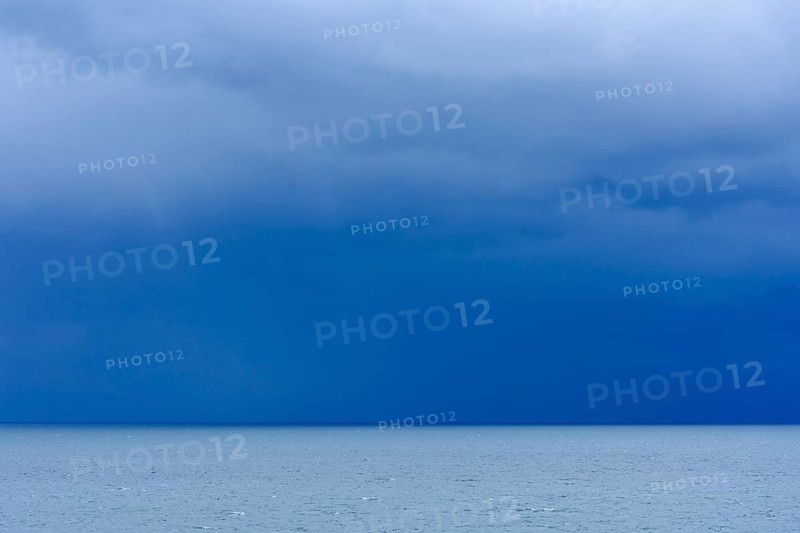 Cloud front over sea