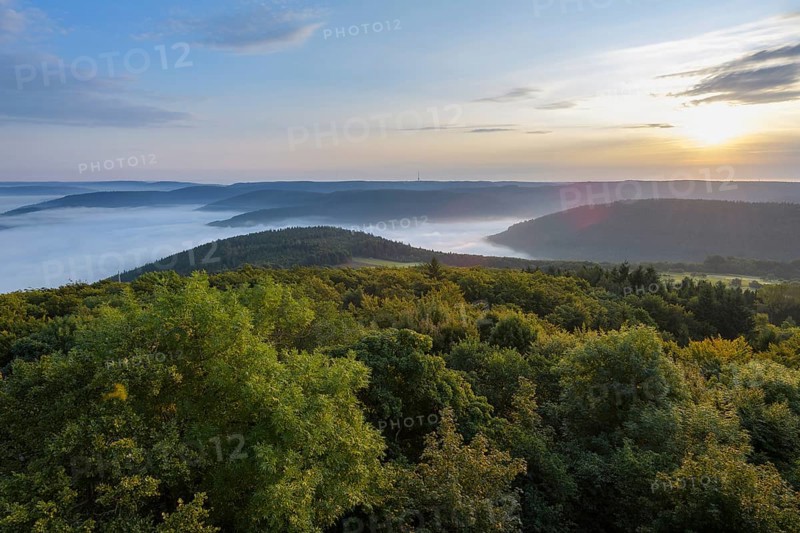 View from Katzenbuckel mountain with morning mist