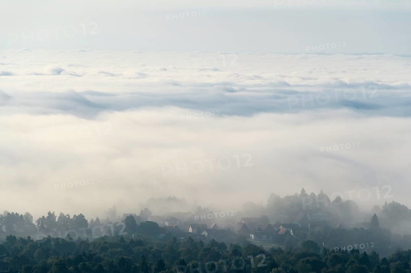View from Katzenbuckel mountain with morning mist