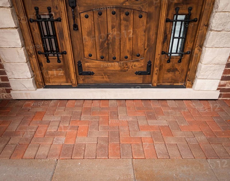 Front door of a house without doormat