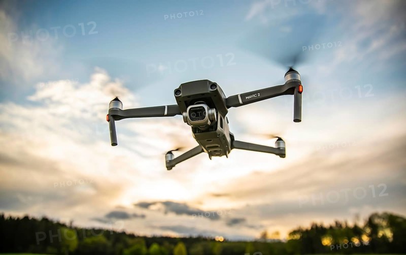 DJI Drone Mavic 2 Pro with Hasselblad camera flying against blue sky