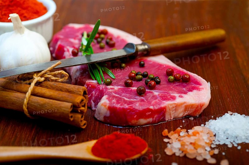 Raw uncooked ribeye beef steak butcher selection