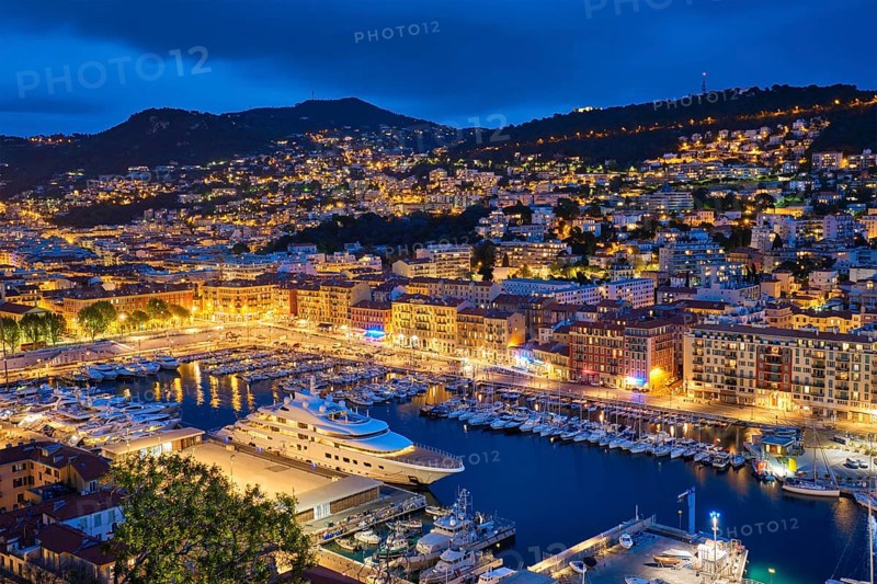View of Old Port of Nice with luxury yacht boats from Castle Hill