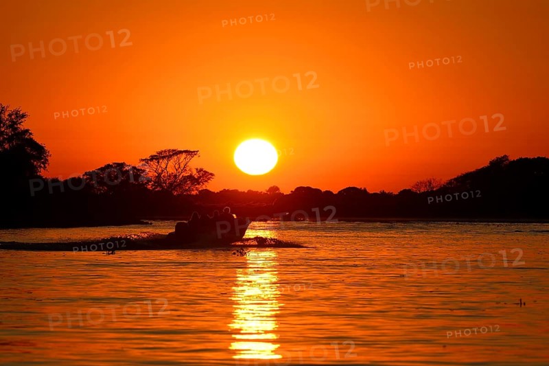 Tourist boat on the Rio Sao Lourenco at sunrise