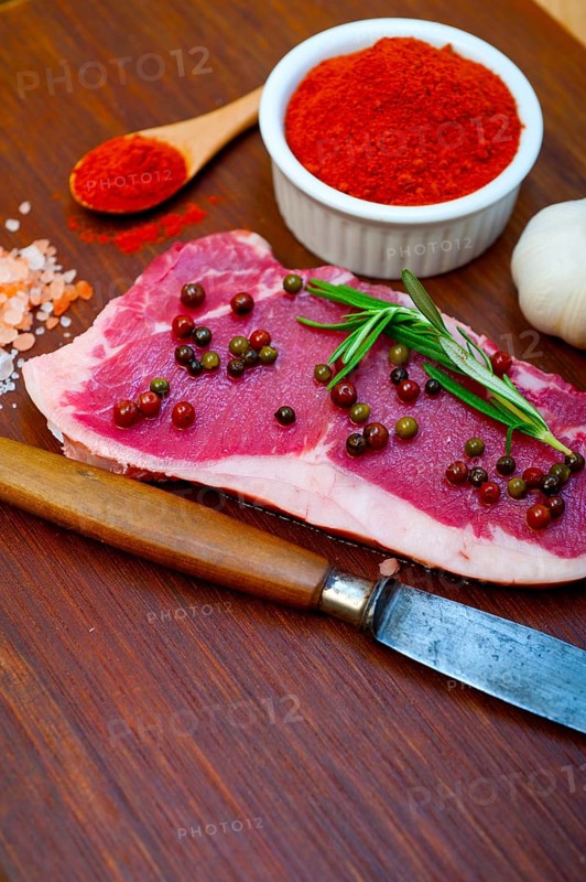 Raw uncooked ribeye beef steak butcher selection