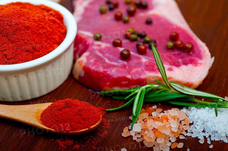 Raw uncooked ribeye beef steak butcher selection
