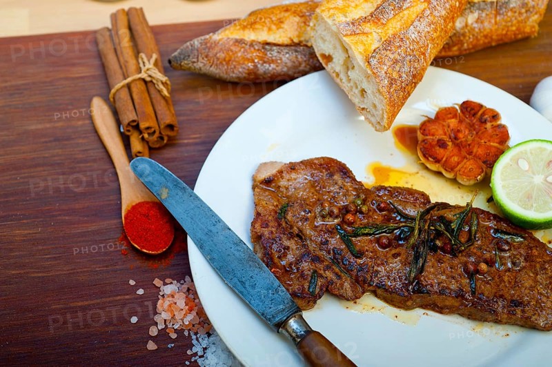 Roasted grilled ribeye beef steak butcher selection