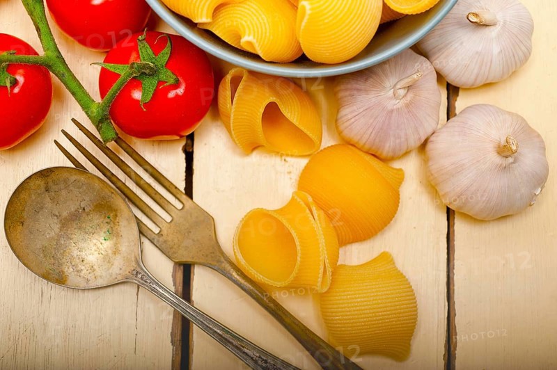 Italian snail lumaconi pasta with ripe cherry tomatoes sauce ingredients