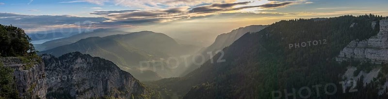 Morning atmosphere over the Val de Travers from the edge of the rocky basin at the Creux du Van