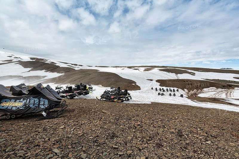 Snowmobiles in rows