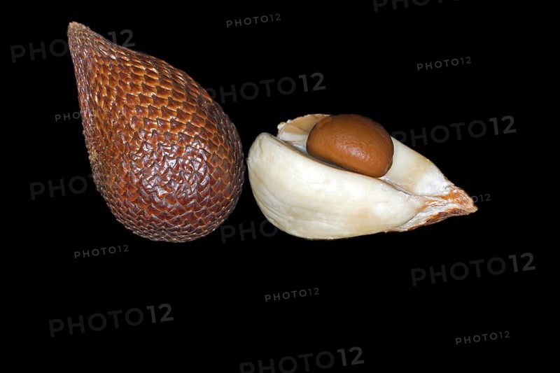 One whole and one halved and peeled salak