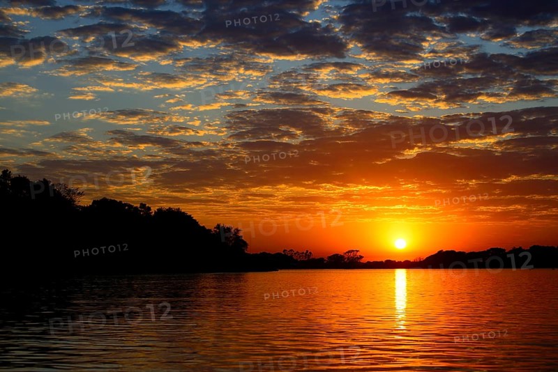 Sunrise with clouds over the Rio Sao Lourenco