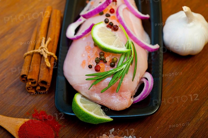 Fresh organic chicken breast with herbs and spices