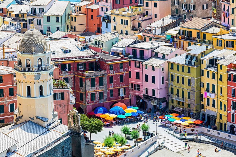 The village of Vernazza with its nested pastel-coloured houses built into the hillside