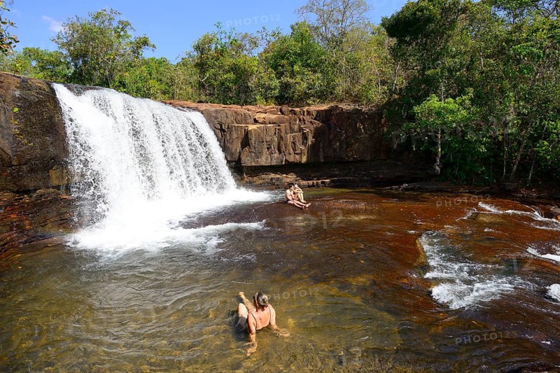 Bathers at the waterfall Cachoeira da Martinha