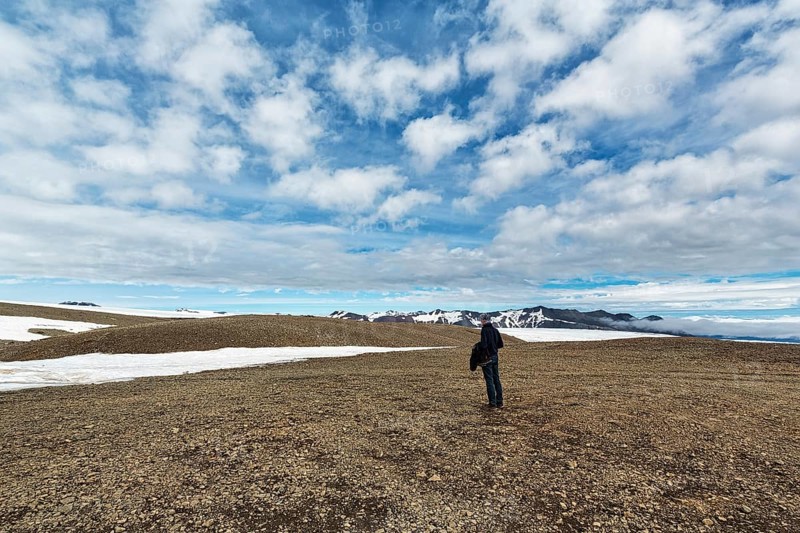 Tourist on stony plateau