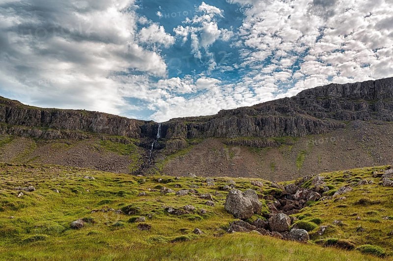 Small waterfall on high cliffs