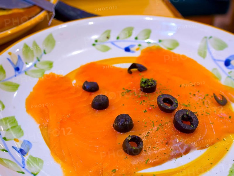 Norwegian smoked salmon with black olives on top