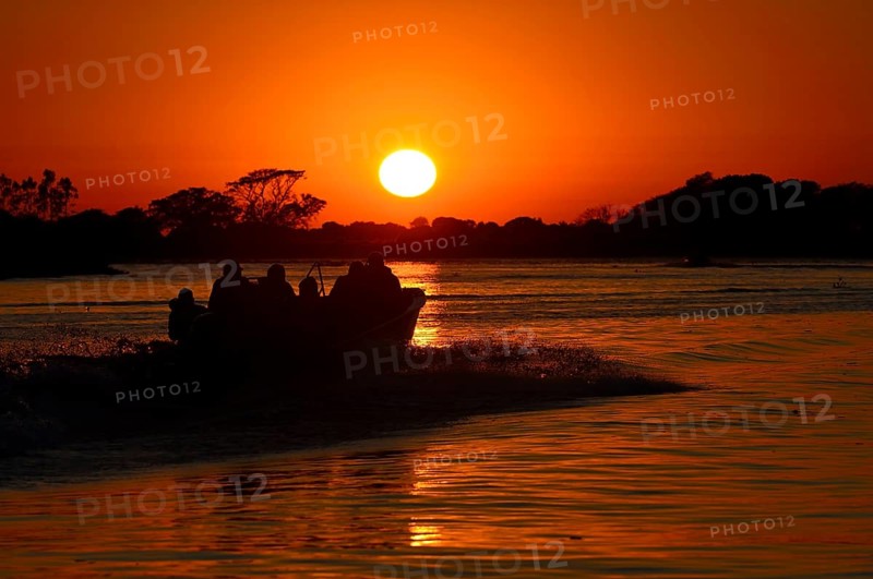 Tourist boat on the Rio Sao Lourenco at sunrise