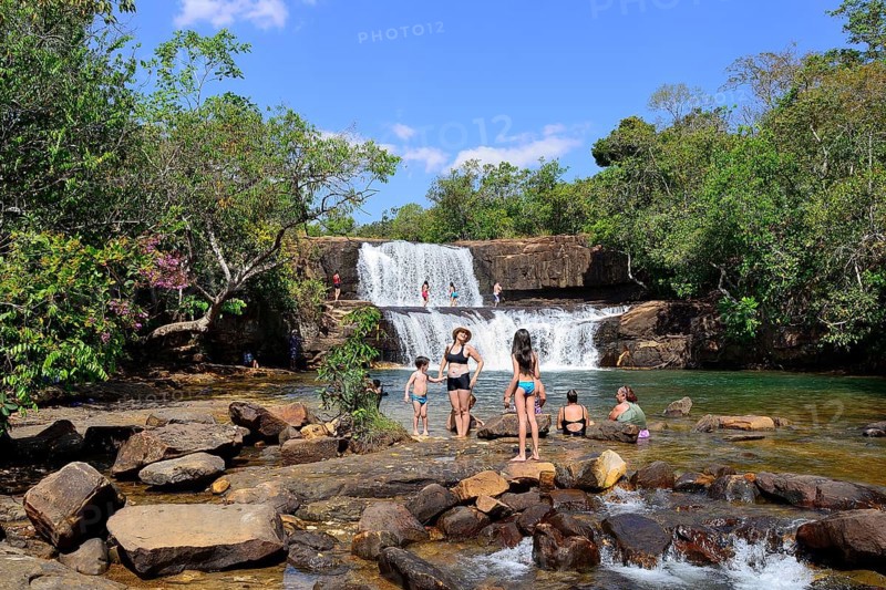 Bathing people at the waterfall Cachoeira da Martinha