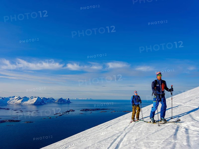 Two ski tourers on the ascent above Bergsfjord