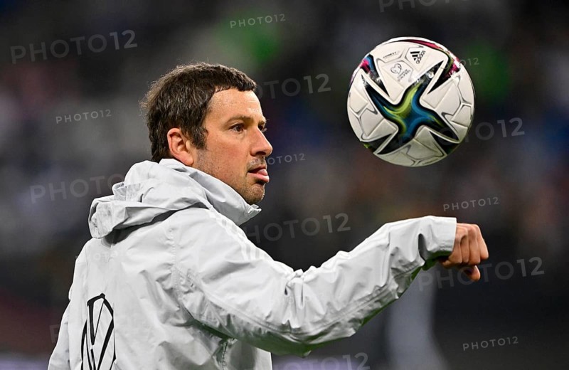 Co-coach goalkeeper coach Andreas Kronenberg GER juggles ball on arm