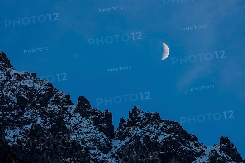 Moonrise over mountains