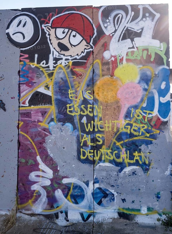 Graffiti on wall remains behind the Urban Gardening project at a new development area at the Old Harbour