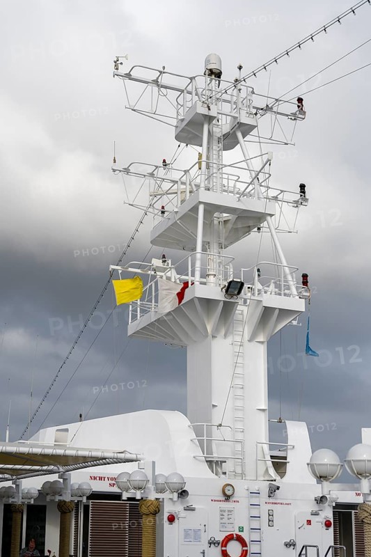 Cruise ship with yellow flag