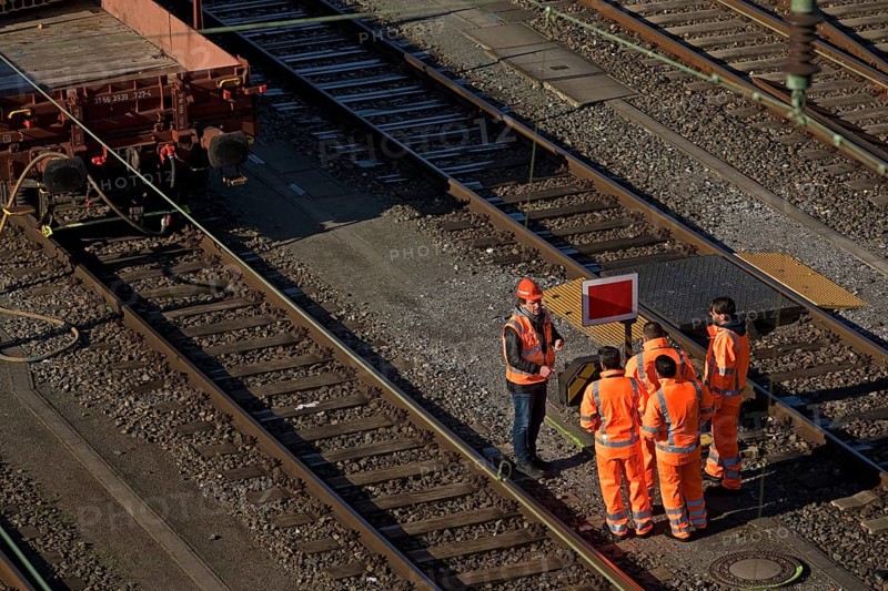 Railway workers talking at the train formation plant in the Vorhalle district