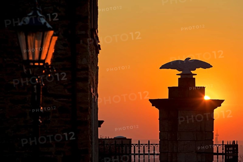 Sunset behind the portal of Bensberg Castle
