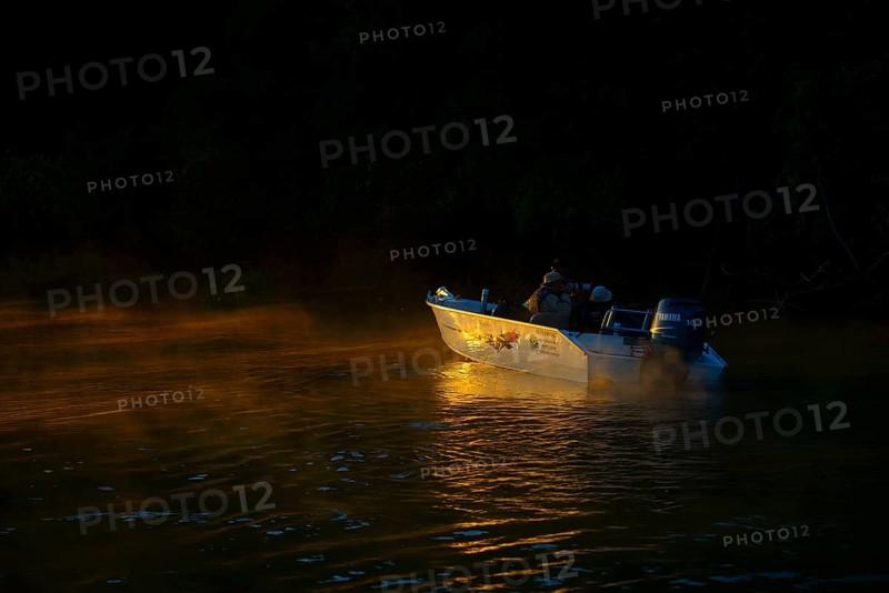 Tourist boat on the Rio Sao Lourenco at sunrise