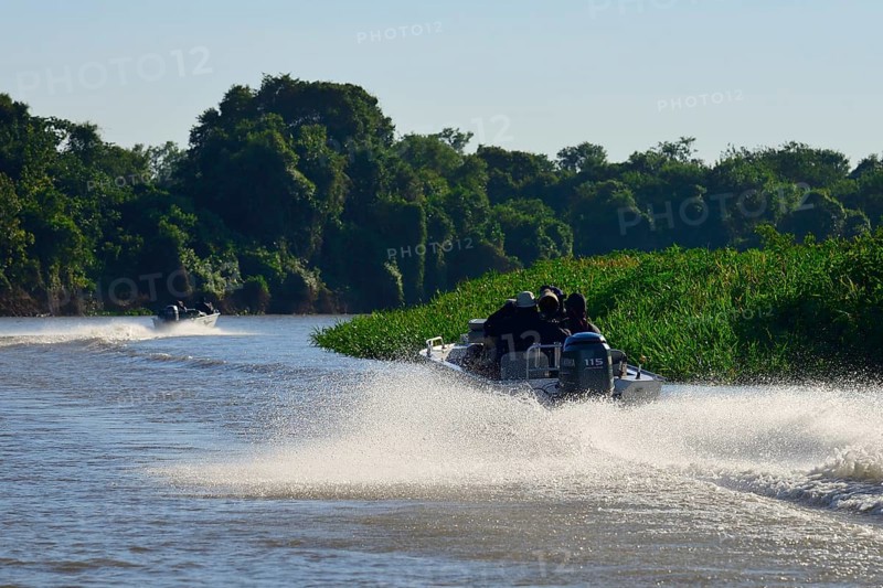 Motorboats with tourists on the Rio Sao Lourenco